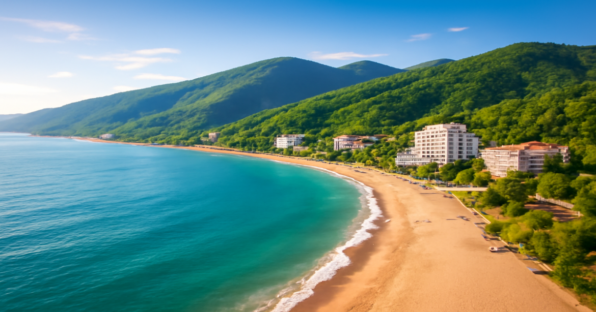 Stunning coastal view of курорты России, showcasing Sochi's beaches and mountains in summer.